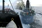 090206 Sea Shepherd crew throw bottles of rotten butter at Yushin Maru No 3   1